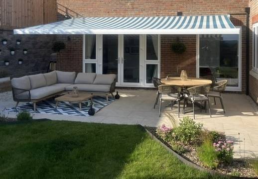 Patio awning over an outdoor seating area