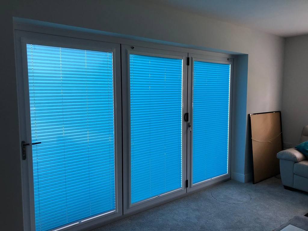 Pleated blinds fitted to French doors